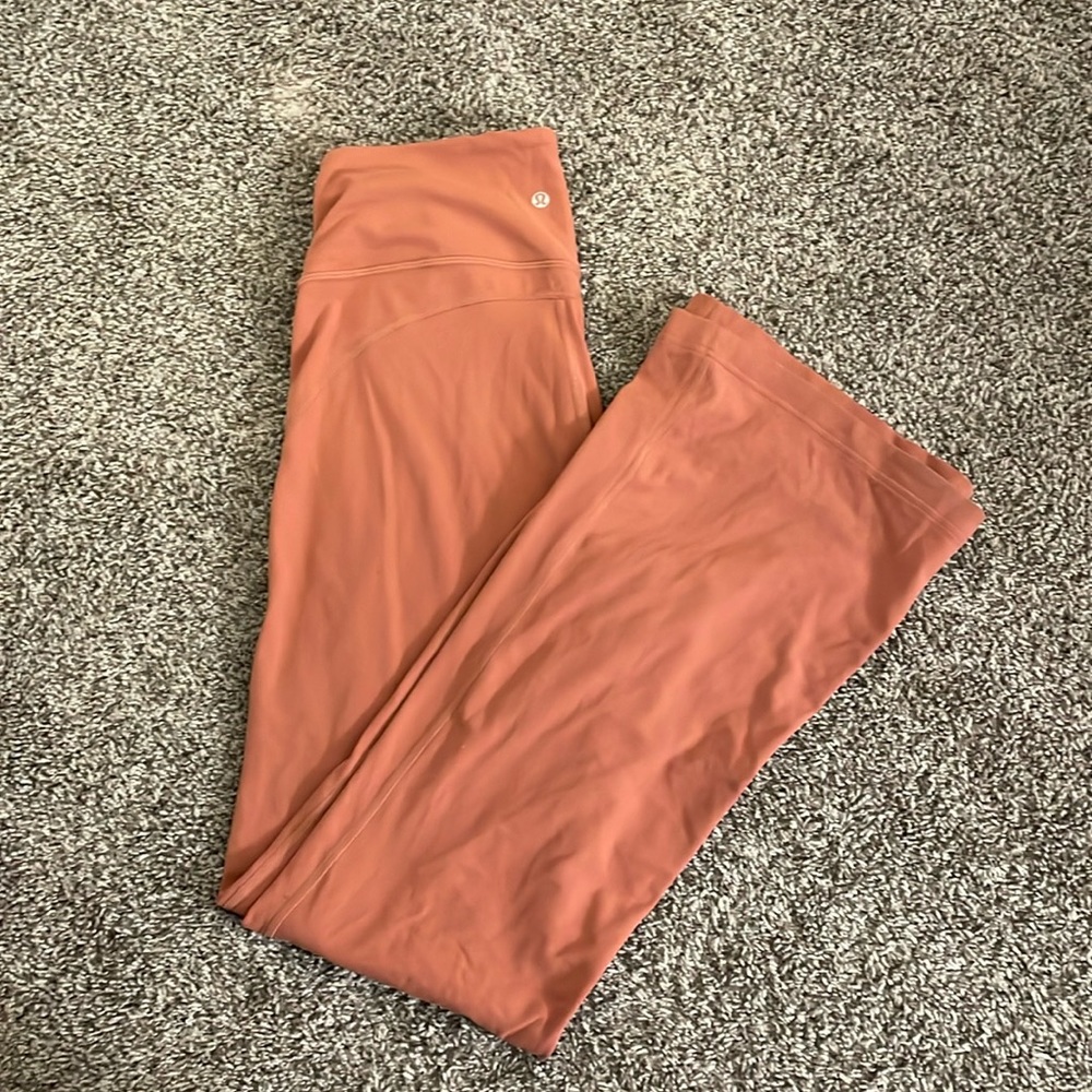 Pink Lululemon flared legging